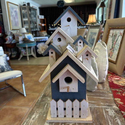 Blue and white birdhouse