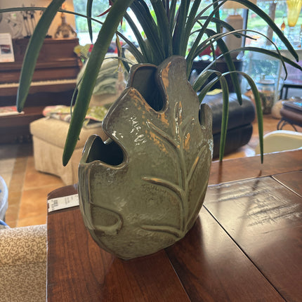 Floral Arrangement In Leaf Vase