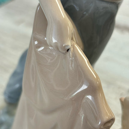 Lladro Boy with Dog Figurine