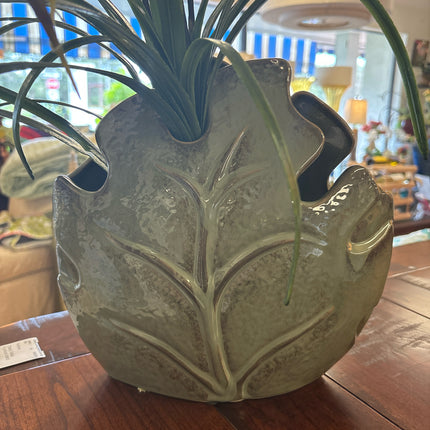 Floral Arrangement In Leaf Vase